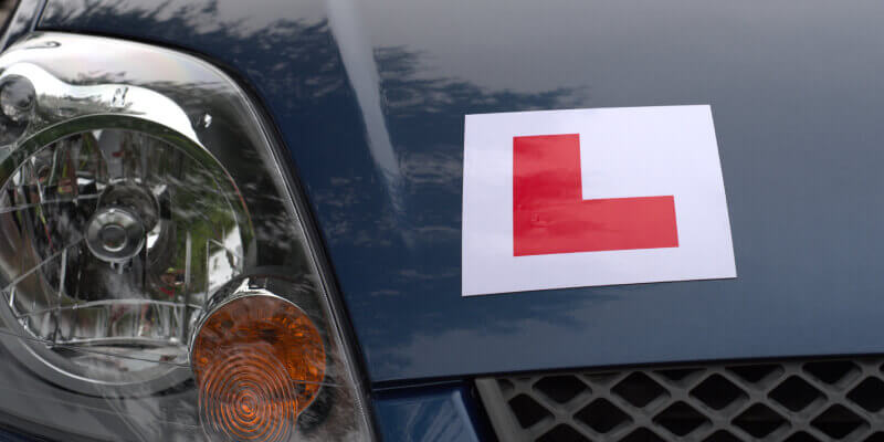 Learner sign stuck onto car bonnet